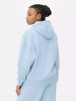 Primark Bluzy<Oversize'owa bluza z kapturem i nadrukiem