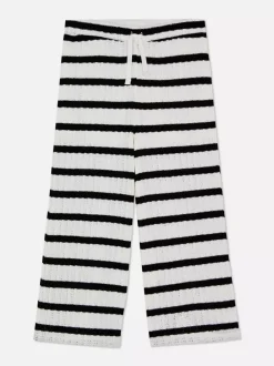 Dzieci Primark Spodnie I Legginsy<Dzianinowe spodnie w paski ze sznurkiem