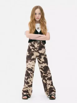 Dzieci Primark Jeansy<Jeansy z szerokimi nogawkami w krowie łaty