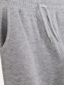 Dzieci Primark Spodnie Dresowe<Spodnie dresowe ze sznurkiem w pasie i ściąganymi nogawkami