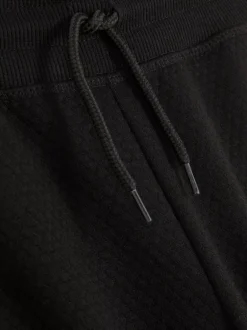 Dzieci Primark Spodnie Dresowe<Teksturowane spodnie dresowe ściągane sznurkiem