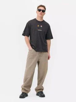 Primark Topy I T-Shirty<T-shirt z efektem sprania i motywem obrazu Basquiata