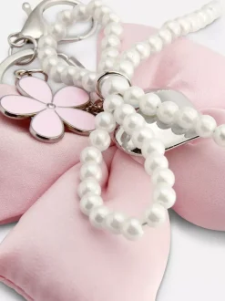 Primark Biżuteria<Usztywniana kokarda z zawieszką